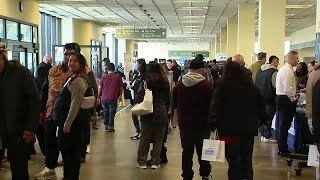 Alaska businesses hunt for workers at airport job fair as summer tourism season approaches
