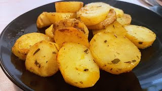 Baked potatoes with spices in a baking bag