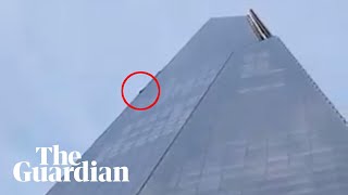 Free climber scales London's Shard skyscraper