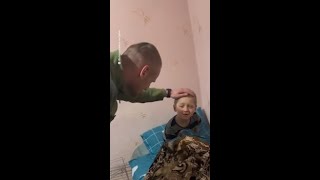 Ukrainian boy in disbelief as father returns from war