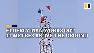 Elderly Chinese man works out 10 metres above the ground