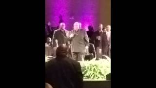 Pastor Hurley Coleman singing \