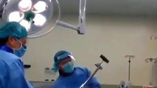 an orthopaedic team removing an intramedullary nail