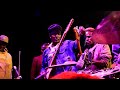 Kativui Mweene tuning guitar at Lysak During Mbaitu Night