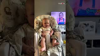 Baby smiles hearing the voice of Ms. Rachel