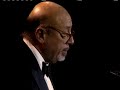 ahmet ertegun accepts award rock and roll hall of fame inductions 1987