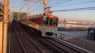 【阪神電車】 景色のいい淀川駅で急行が朝日に消えてく…