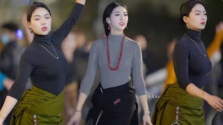 Admiring beautiful Tibetan women, traditional Tibetan dance and Tibetan song