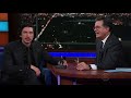 adam driver and stephen act out a star wars scene using dolls