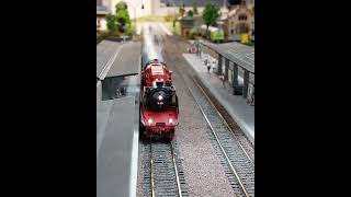 The red steam locomotive BR 18 201 on the way to the main station.