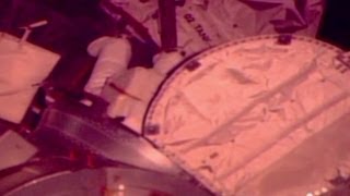 NASA aborts spacewalk to clear water from suit