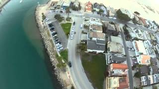 Beach swoop through buildings