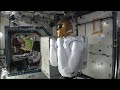 iss crew unpacking robonaut for real this time