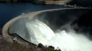 Kariba Dam wall 3 flood gates open.MPG