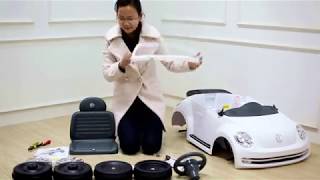 Hands on the Rollplay 6 Volt VW Beetle Ride On Toy, Battery-Powered Kid's Ride On Car