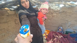 Operator's help preparing syrup for a child's cold. Zainab baking local bread for the children.