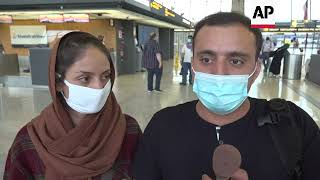 Afghan couple reunites in US after long evacuation