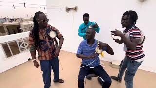 Tama talking drums in Senegal. The great griot family of Massamba Diop