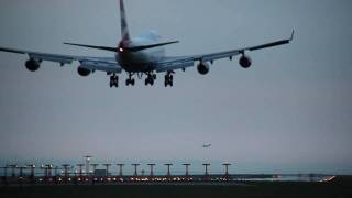 BA 747 Landing Dangerously Crossing Another Plane