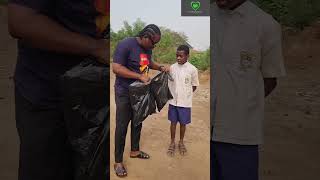 I supported this young boy with a new school bag and socks .