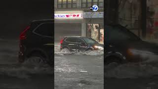 NYC drivers push through flooding after intense rainfall