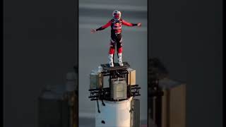 Dakar Rally winner Sam Sunderland stands on top of Burj Khalifa