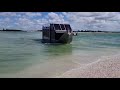 crazy things seen while island hopping a trailerable houseboat that lifts itself out of the water