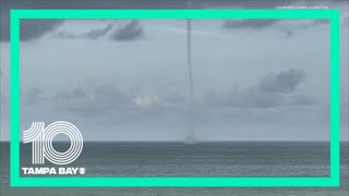 Twin waterspouts, single funnel, captured on camera near Redington Beach