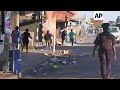 Soldiers and riot police chasing protesters in Harare