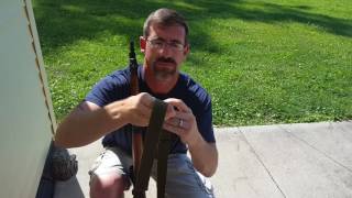 Setting up a hasty sling.