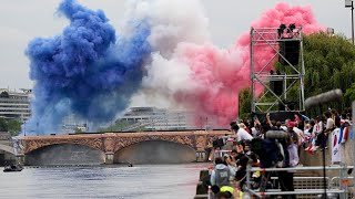 Athletes float down Seine in Paris Olympics opening ceremony