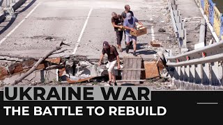 Residents of destroyed Ukrainian village determined to rebuild