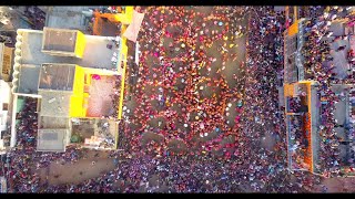 Crazy colourful festive celebration in India! Lathmar holi aerial view of Mathura Holi on 26th March