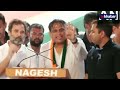 rahul gandhi continues speech amid rain in karnataka राहुल बोले कर्नाटक में 150 सीट लाएंगे video