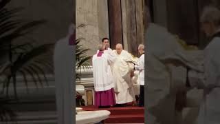 The Holy Father, Francis, is vesting before the celebration of the Mass