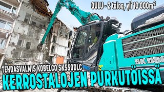 Kivirock Expo - Tehdasvalmis Kobelco SK550DLC kerrostalojen purkutyömaalla Oulussa