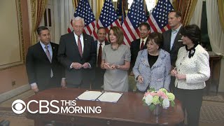 Trump signs spending bill, temporarily reopening the government