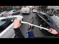 cyclist skillfully weaves his way through traffic viralhog