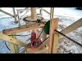 COLD winds→VAWT→'Side Bow' chain drive→red compressor