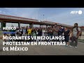 Migrantes venezolanos protestan en fronteras de México ante nueva política de EEUU | AFP