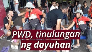 SONA: Dayuhan, binigyan ng wheelchair ang isang PWD