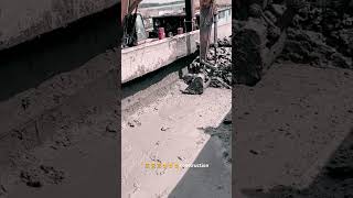 Clean up mesh concrete with excavator