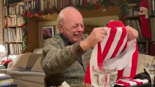 The emotional reaction of an Atlético Madrid fan when he receives his COPA retro shirt for Christmas