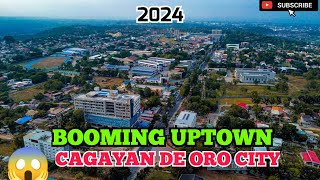 Booming Uptown CDO|From the early '90s, a grassland has transformed into a central business district