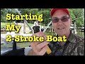 Starting the Evinrude 90 HP 2 stroke outboard boat engine.