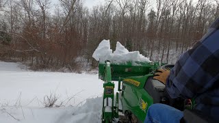 Plowing snow with the John Deere 1025R during snow Magadan 2025 pt2