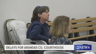 What is holding back the new Aransas Co. Courthouse from opening?