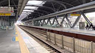 Taiwan Railway - Tze-Chiang Limited Express E1000 Series Train speeding through Wuquan Station