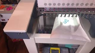 Learn how to use shoe frame hoop on a 15 needle embroidery machine.