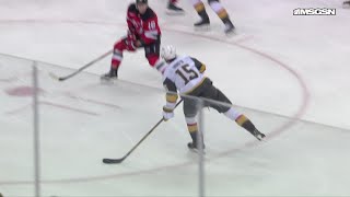 Jack Eichel scores a goal against the New Jersey Devils